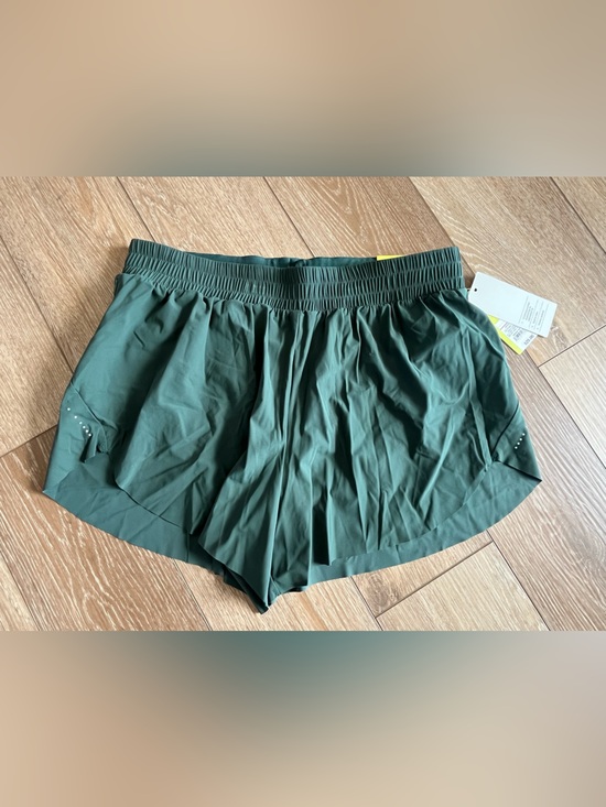 all in motion Pants - NWT all in motion green mid rise run shorts 3" Size S built in liner